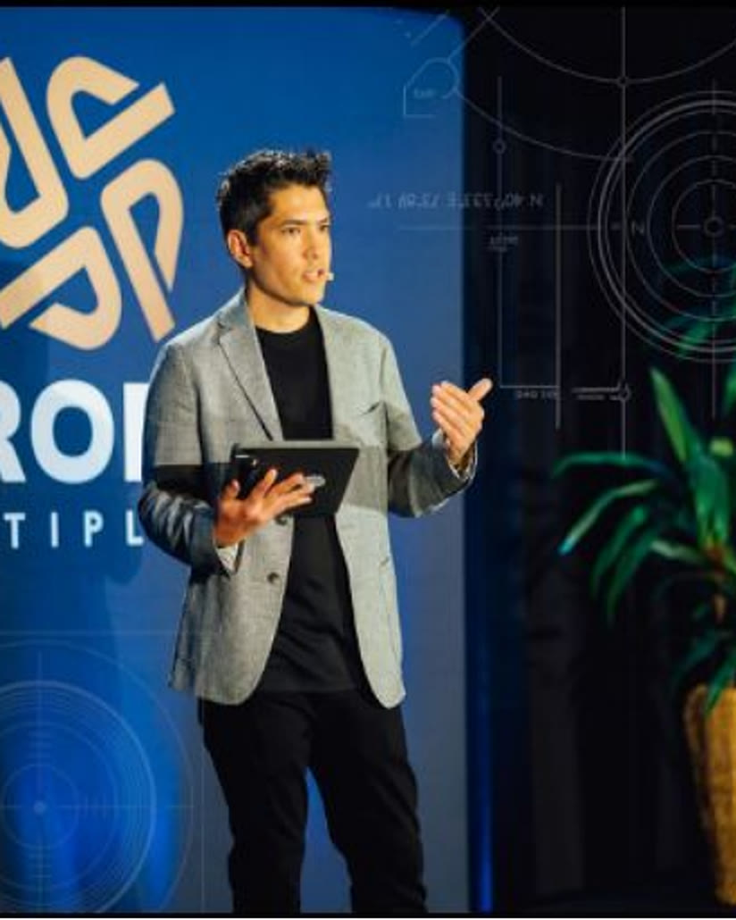 Jordan Hall, founder of Speed2Lead, speaking on stage